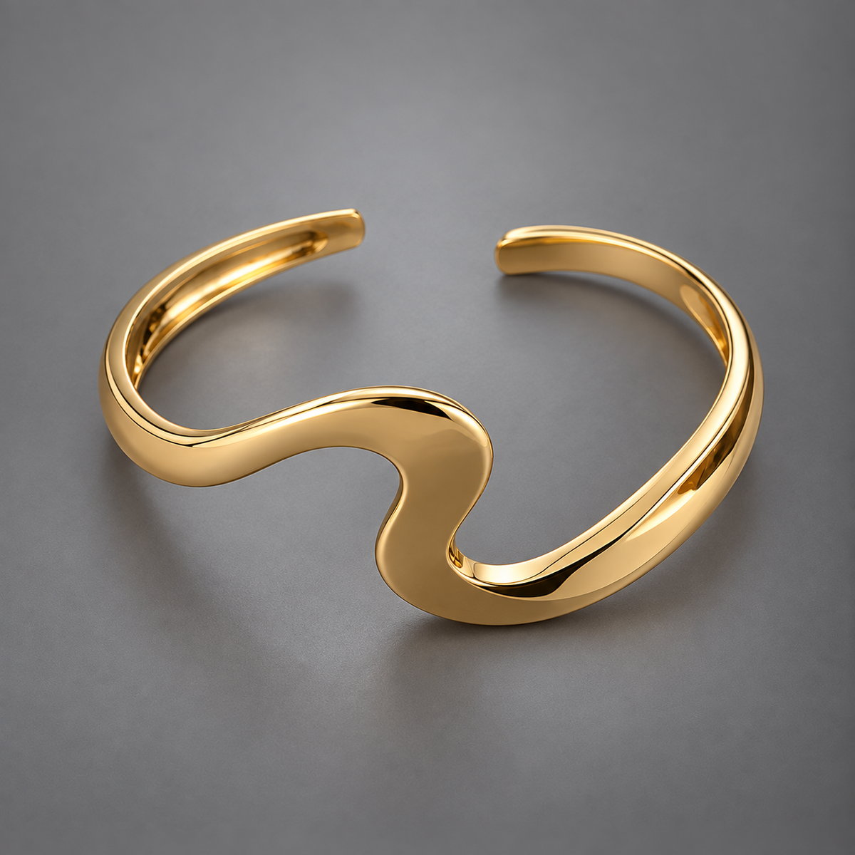 Pulsera clásica abierta con onda dorada